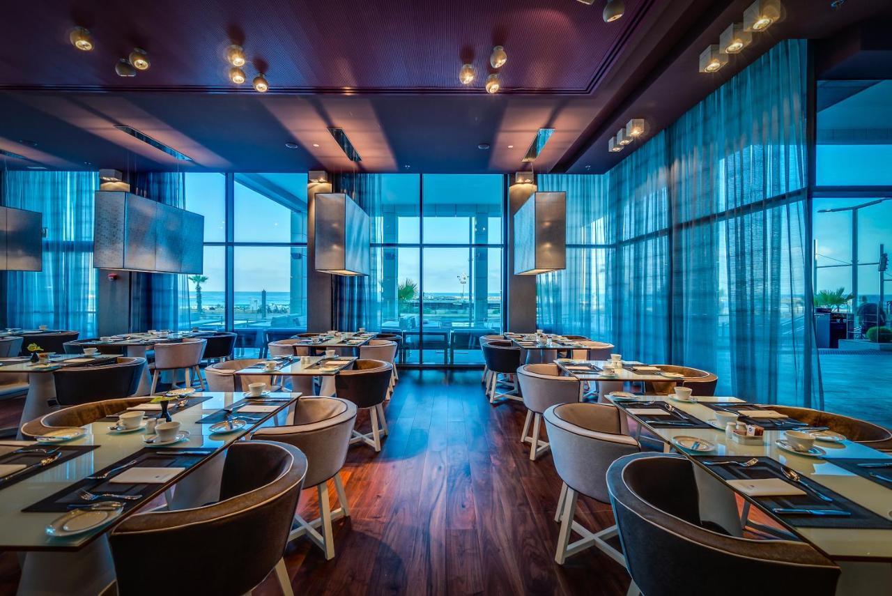 Royal Beach Hotel Tel Aviv By Isrotel Exclusive Екстериор снимка The restaurant